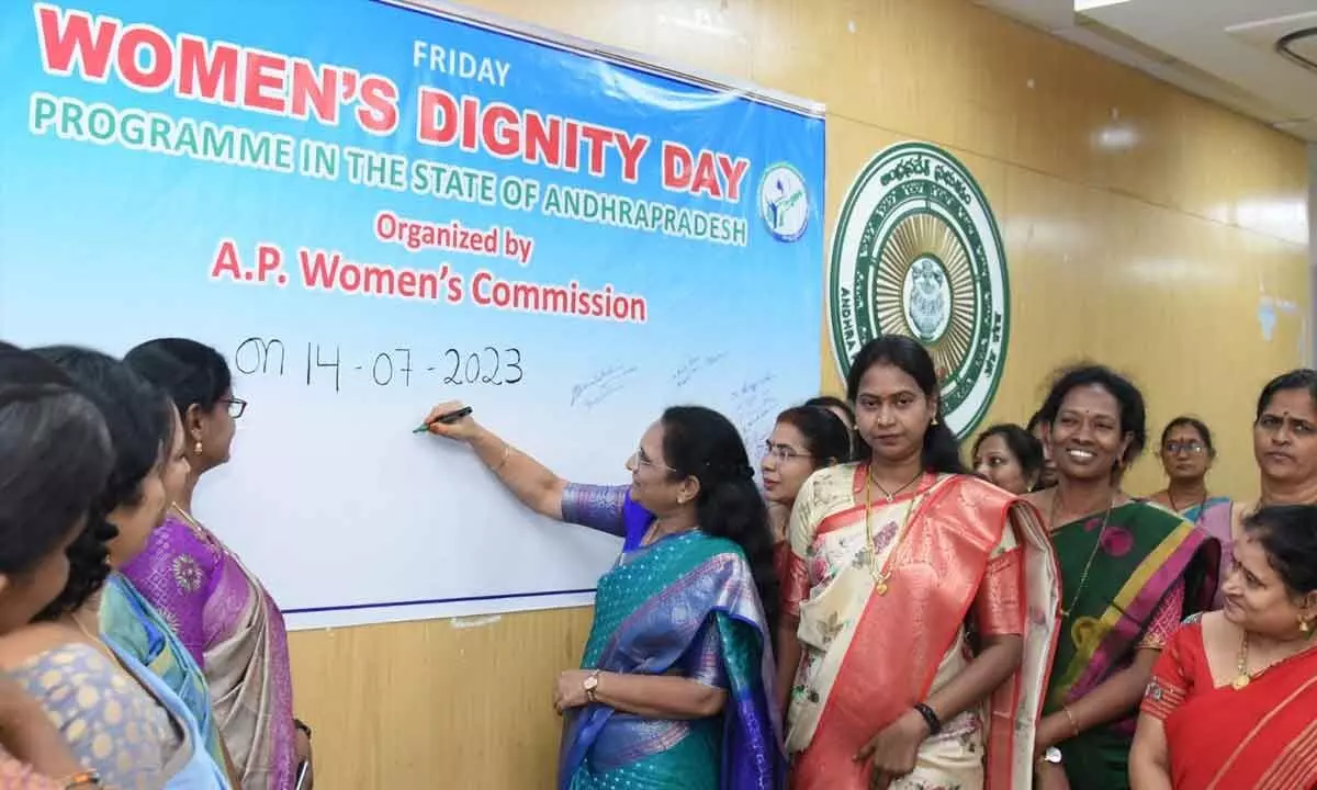 AP Women’s Commission Chairperson Vasireddy Padma and women employees taking part the Women’s Dignity Day event at the State Secretariat at Velagapudi on Friday