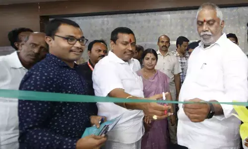 MLAs Malladi Vishnu and Velampalli Srinivasa Rao inaugurating the CRDA stall at the property show set up by the NAREDCO in Vijayawada on Friday