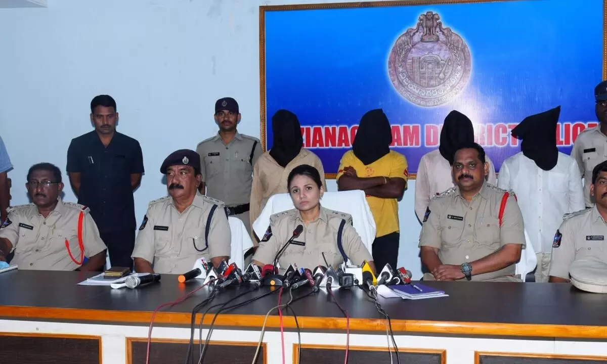 Superintendent of Police Deepika M Patil producing the accused before the media at her office in Vizianagaram on Sunday