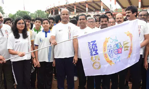 Sub-collector Aditi Singh flagging off the golden run in Vijayawada on Sunday 						      (Photo: Ch Venkata Mastan )