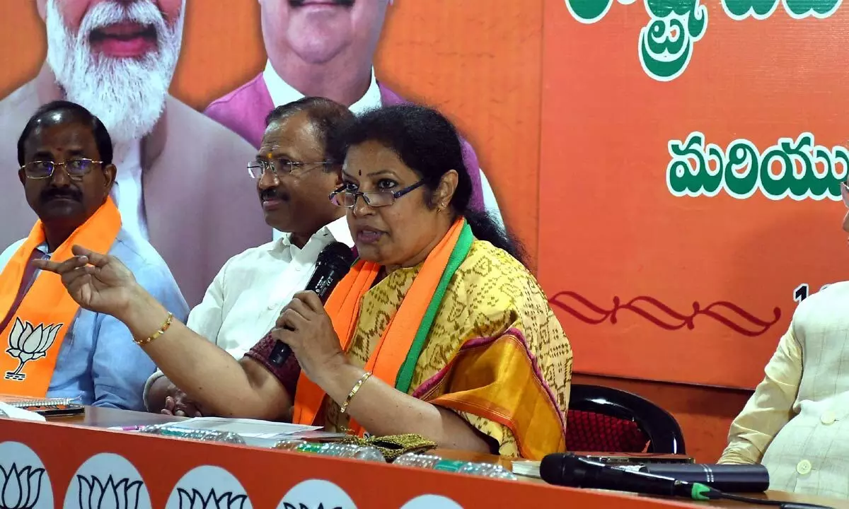 BJP State president and former Union Minister Daggubati Purandeswari  addressing the  State executive meeting at State party office in Vijayawada on Sunday. Former Union Minister Muralidharan, MP GVL Narasimha Rao and Somu Veerraju are also seen.  Photo: Ch Venkata Mastan