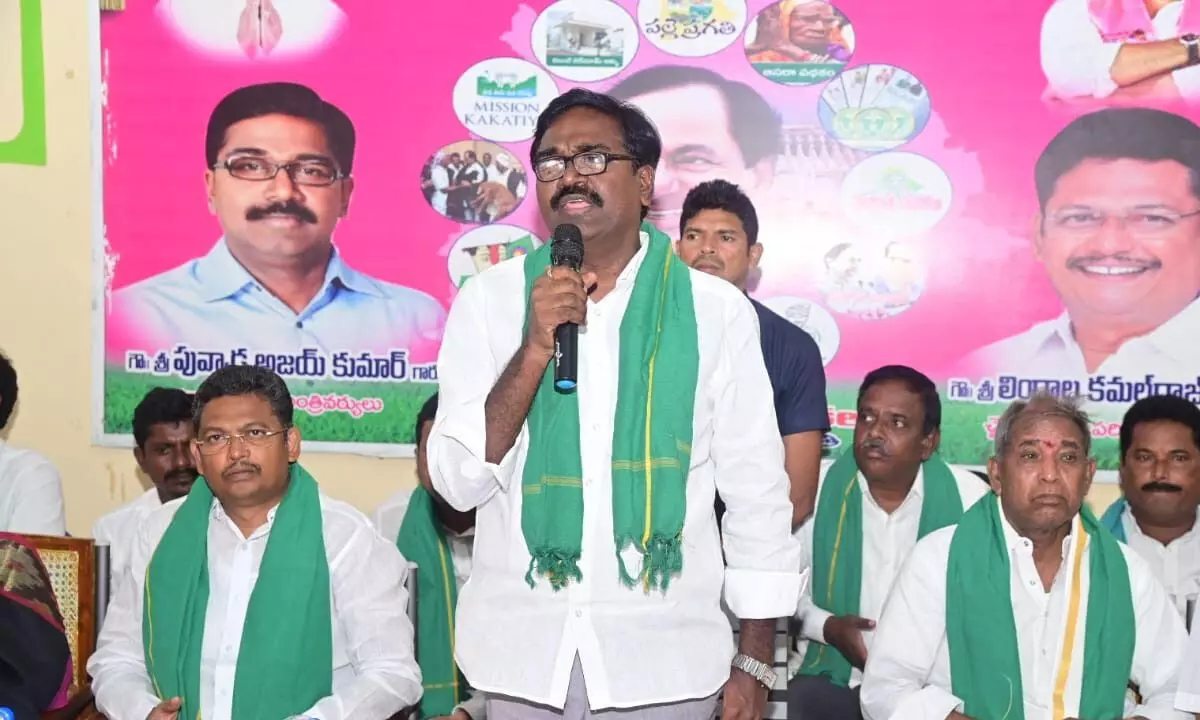 Minister for Transport Puvvada Ajay Kumar speaking with farmers at Chintakani mandal Rythuvedika in Khammam district on Monday