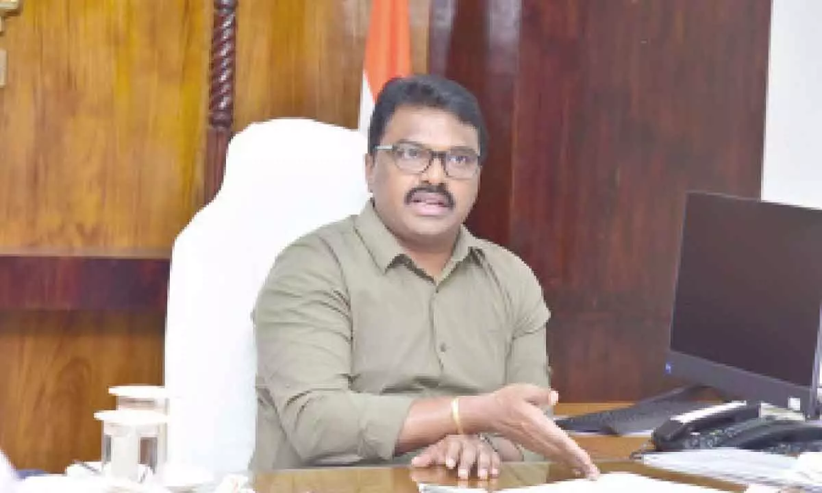 Krishna district Collector P Raja Babu conducting teleconference from his chamber at at Machilipatnam Collectorate on Monday