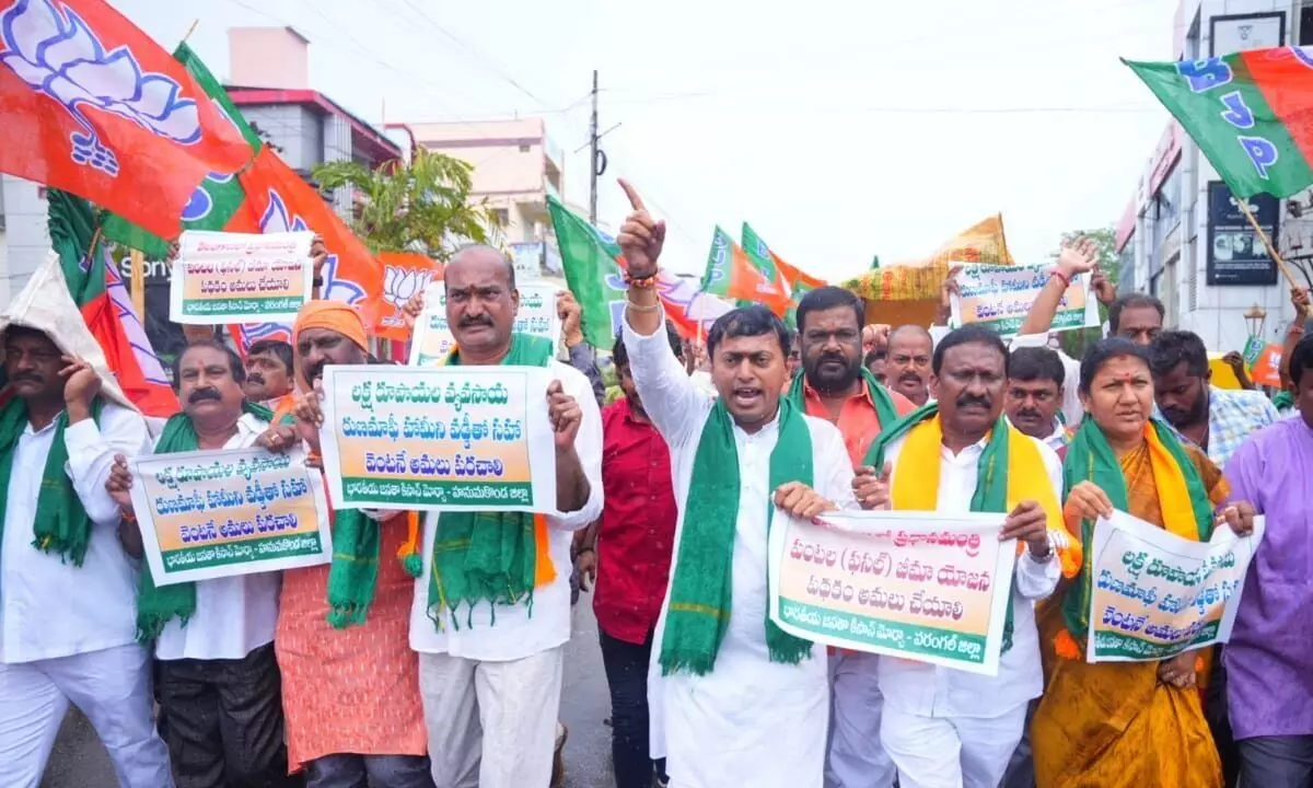 BJP cadres taking out a rally in Hanumakonda on Tuesday