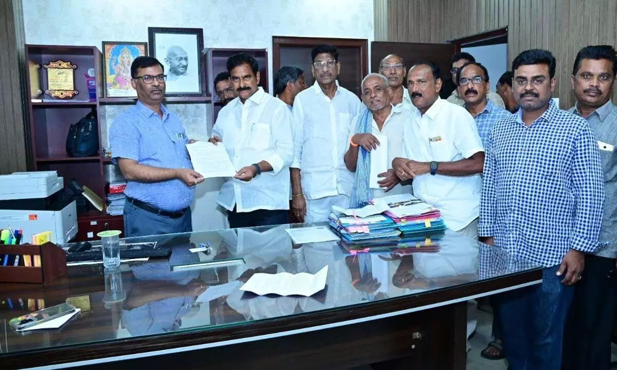 Former Minister Devineni Umamaheswara Rao submitting representation to the NHAI authorities in Vijayawada on Tuesday