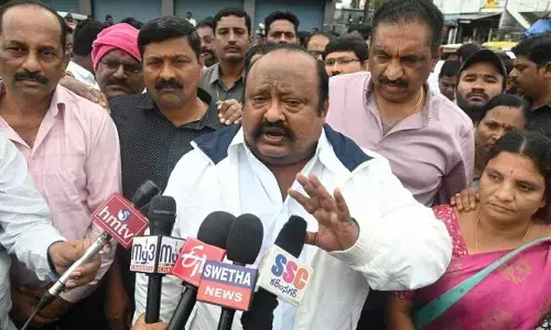 Minister G Kamalakar speaking to the media in Karimnagar on Tuesday