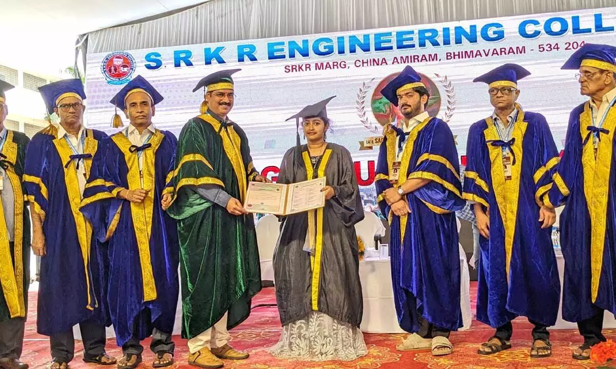 Telangana State Mission Bhagiratha Chief Engineer J Madhu Babu handing over certificates to students in SRKR Engineering College Bhimavaram on Tuesday