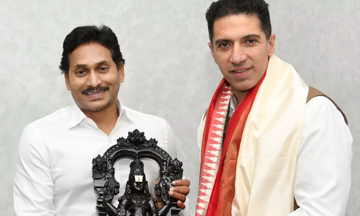 Chief Minister Y S Jagan Mohan Reddy at his camp office in Tadepalli on Tuesday felicitating Raheja Group president Neel Raheja