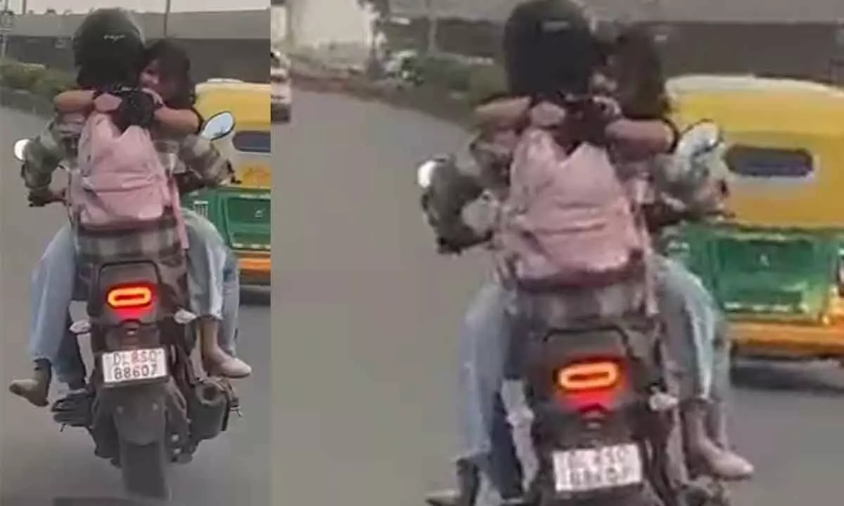 Watch The Viral Video of Couples PDA On Moving Bike Sparks Attention And Delhi Traffic Police Response
