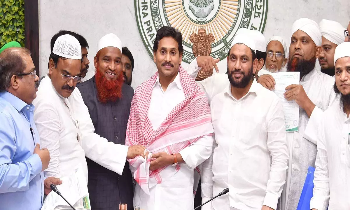 Members of a Muslim delegation meeting Chief Minister Y S Jagan Mohan Reddy at his camp office in Tadepalli on Wednesday