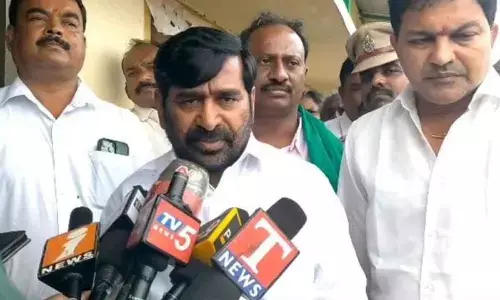 Minister Jagadish Reddy along with local MLA Saidi Reddy addressing the media in Huzurnagar on Thursday