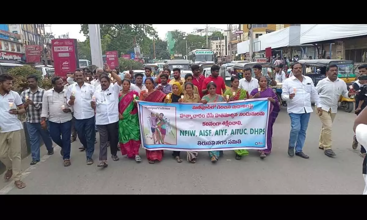 CPI, NFIW, AISF and AIYF activists taking out a candle light rally condemning parading women naked in Manipur, in Tirupati on Friday.