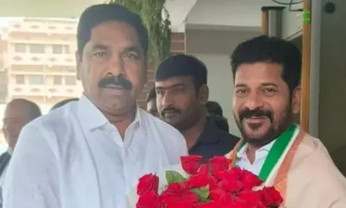 Former IPS officer K R Nagaraju meets the TPCC president A Revanth Reddy in Hyderabad on Friday