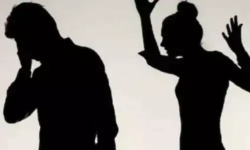 Wife attacks husband for watching first wife Instagram videos in Nandigama