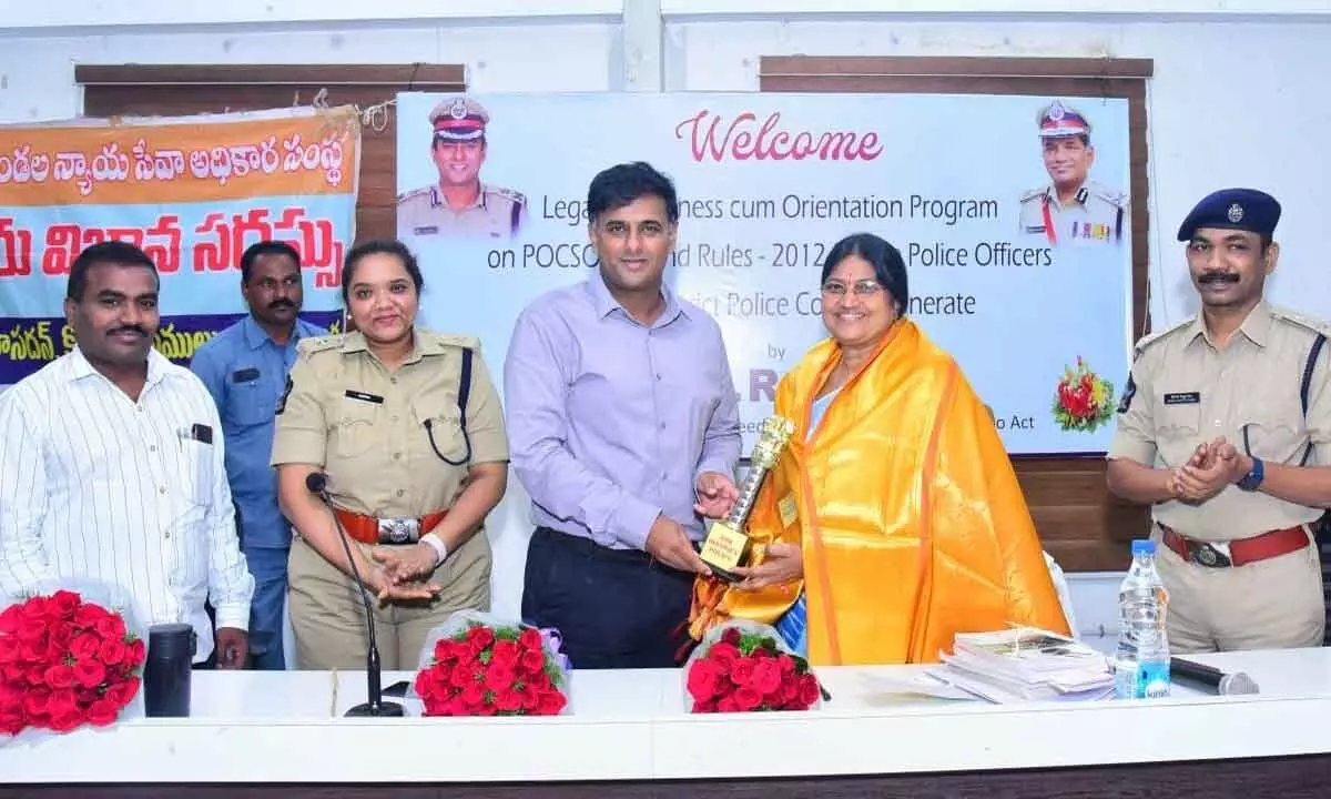 Commissioner of Police Kanthi Rana Tata felicitating Special Judge for Speedy Trial of Offences  under POCSO Act Dr S Rajani at a meeting held at the police control room in Vijayawada on Saturday