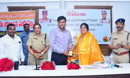 Commissioner of Police Kanthi Rana Tata felicitating Special Judge for Speedy Trial of Offences  under POCSO Act Dr S Rajani at a meeting held at the police control room in Vijayawada on Saturday