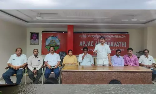 APJAC Amaravati chairman Bopparaju Venkateswarlu addressing a meeting at the Revenue Bhavan in Vijayawada on Sunday