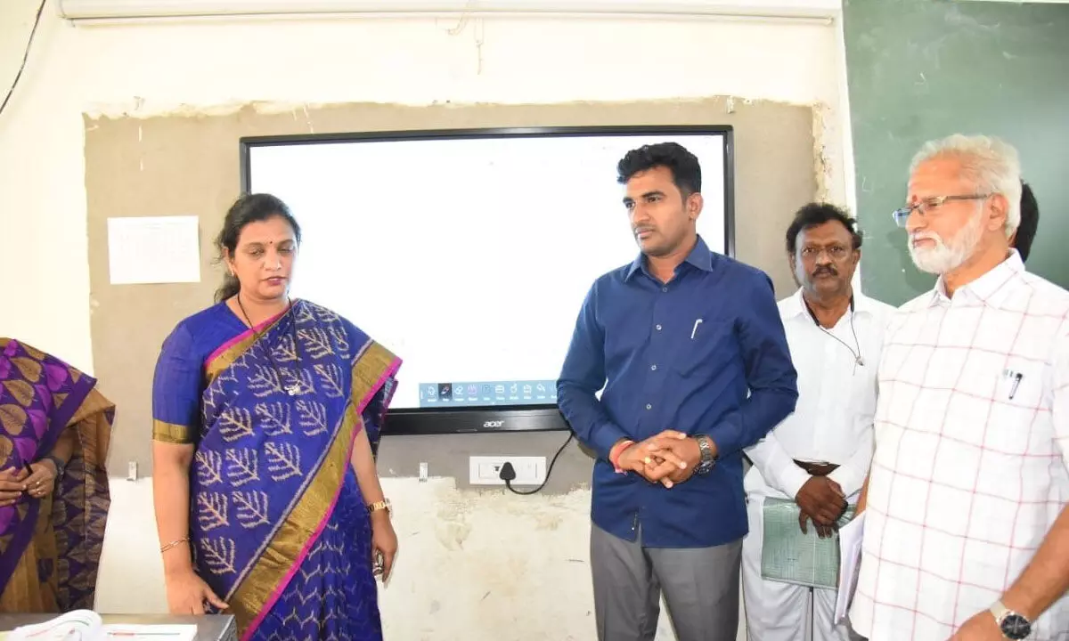 District Collector M Gautami interacting with DEO and other officials in Tadipatri on Sunday