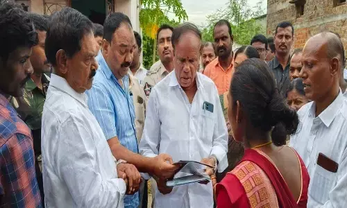 Deputy Chief Minister K Narayana Swamy interacting with  the residents of Indiramma Harijan Colony in GD Nellore  mandal on Sunday