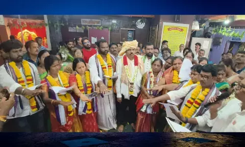 New trust board members take oath