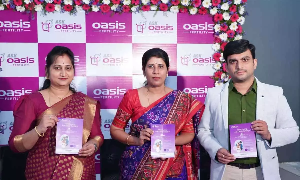 Karunasri, Dr Sujatha Vellanki and B Vinod of Oasis Fertility inaugurating the artificial intelligence-powered chatbot Ask Oasis in Vijayawada on Monday