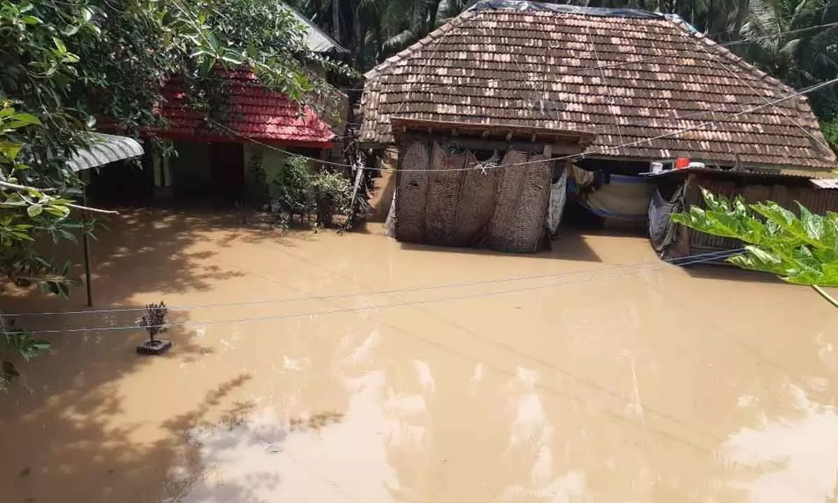 Houses surrounded by floodwater in Muramalla village