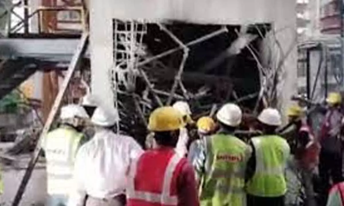 One worker killed after cement mixture machine collapses from building’s 4th floor