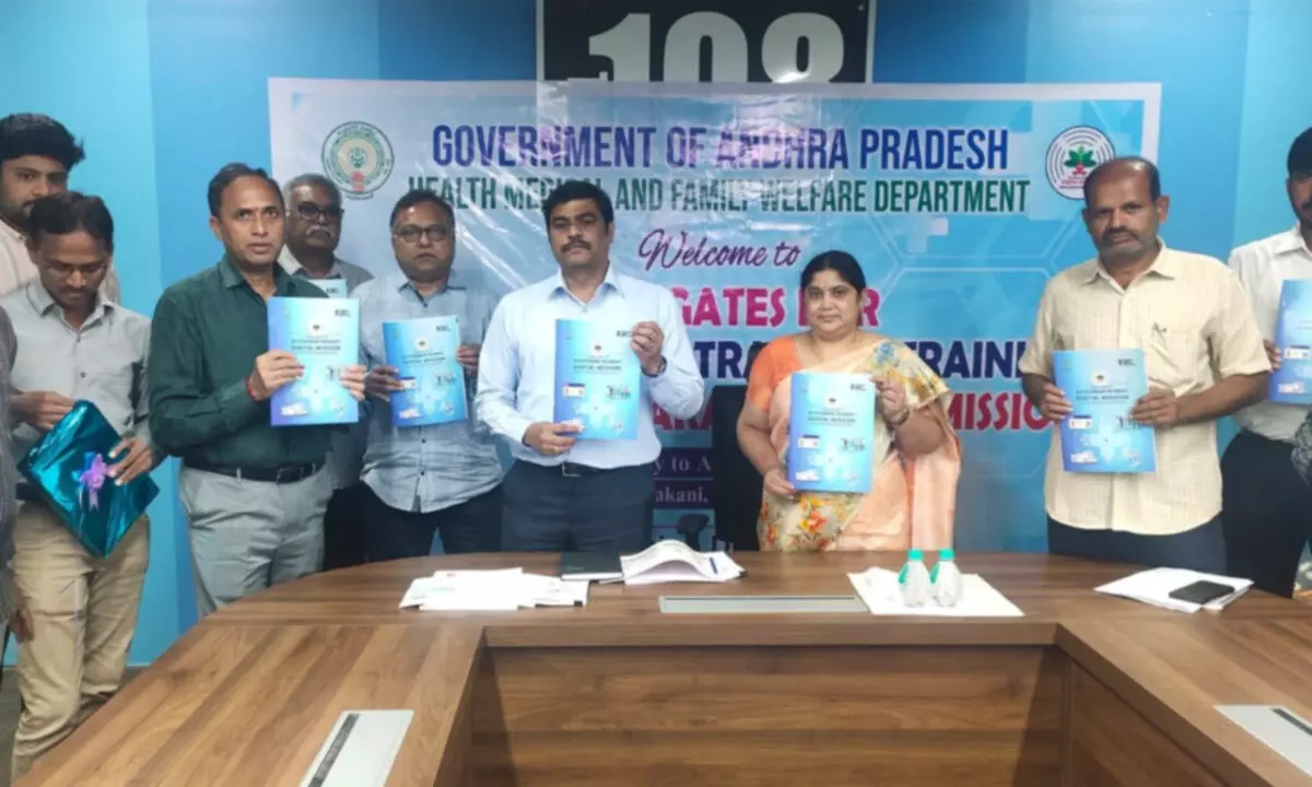 Health and Family Welfare Commissioner J Nivas releasing a brochure titled ‘A Brief Guide on Ayushman Bharat Digital Mission and its Various Building Blocks’ at Chinna Kakani on Tuesday
