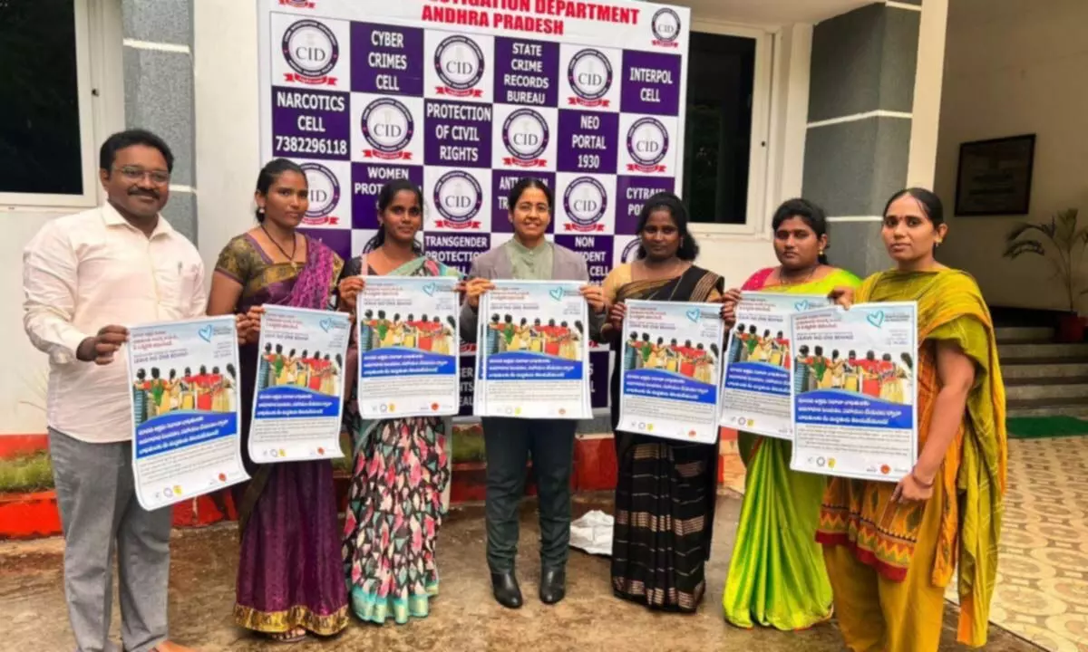 Photo caption: CID SP KGV Sarita along with the representatives of NGOs releasing the poster on human trafficking in Guntur on Tuesday