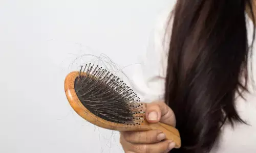 Reverse Postpartum hair fall through Ayurveda