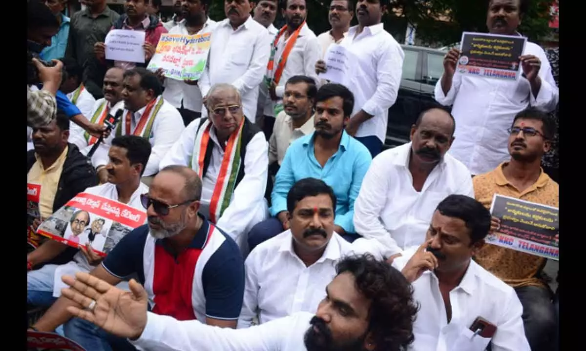 Congress stages dharna at GHMC hqrs, demands aid to rain-hit city dwellers