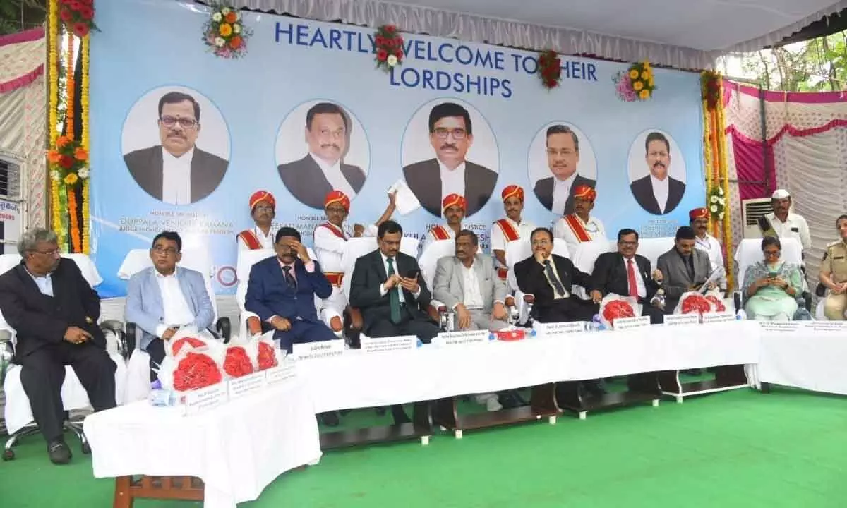 High Court Judges and other officials taking part in the inaugural function of a new court building in  Vizianagaram on Sunday