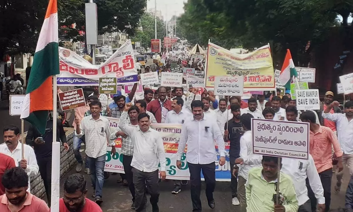 Pastors, Christian leaders and people taking out a peace march in Rajamahendravaram on Monday