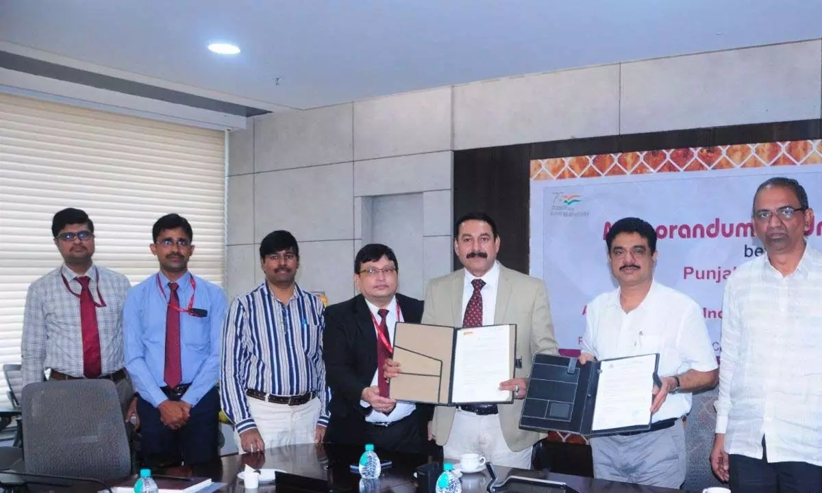 The officials of PNB and APIIC exchanging MoU in Mangalagiri on Monday