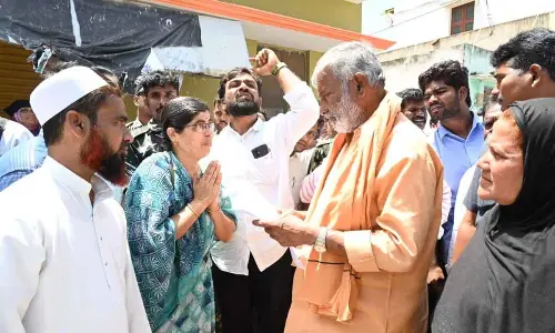 Energy Minister P Ramachandra Reddy interacting with the public in Punganur during his Ward Bata programme on Sunday