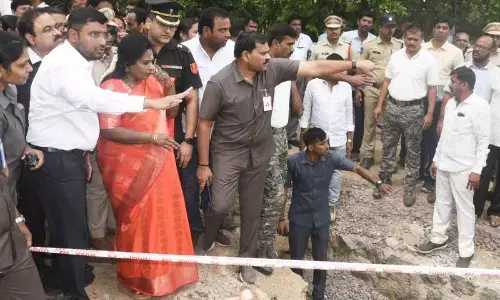Tamilisai Soundarajan visits flood affected Jawahar Colony in Hanamkonda