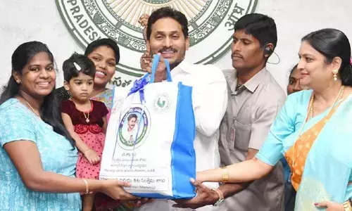 YS Jagan launches YSR Sampoorna Poshana, hands over ration kits to beneficiaries