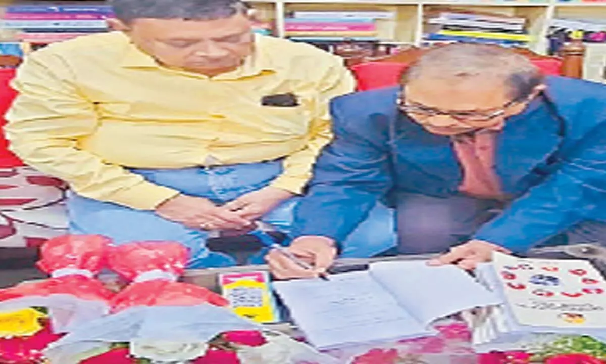 The author (left) seen with Sriramamurthy Suri during the release of the latter’s book ‘The Untapped Potential of Ham Radio’