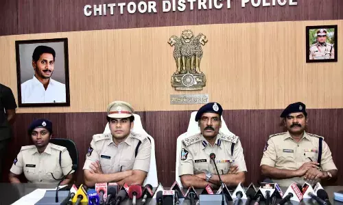 Anantapuram DIG Ammi Reddy is seen speaking to media here . District SP Rishanth Reddy and others are seen.