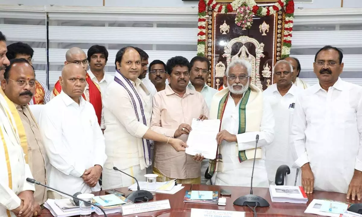 Chennai Local Area Committee Chairman Sekhar Reddy handing over a DD towards the donation to TTD Chairman Y V Subba Reddy at Annamaiah Bhavan in Tirumala on Monday