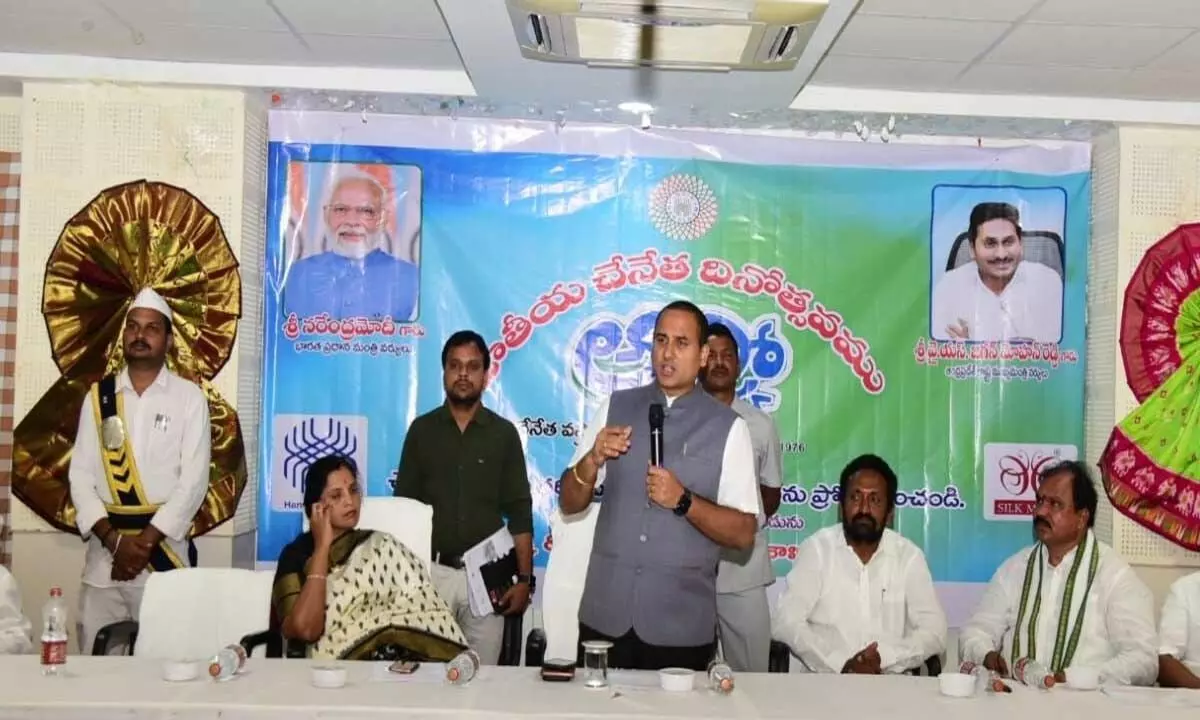 District Collector V Vijaya Rama Raju addressing a programme held on the occasion of 9th National Handloom Day in Kadapa on Monday