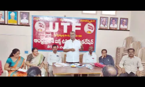UTF State president N Venkateswarlu addressing the UTF office-bearers meeting in Tirupati on Sunday. UTF district secretary K Muthyala Reddy and others are also seen.