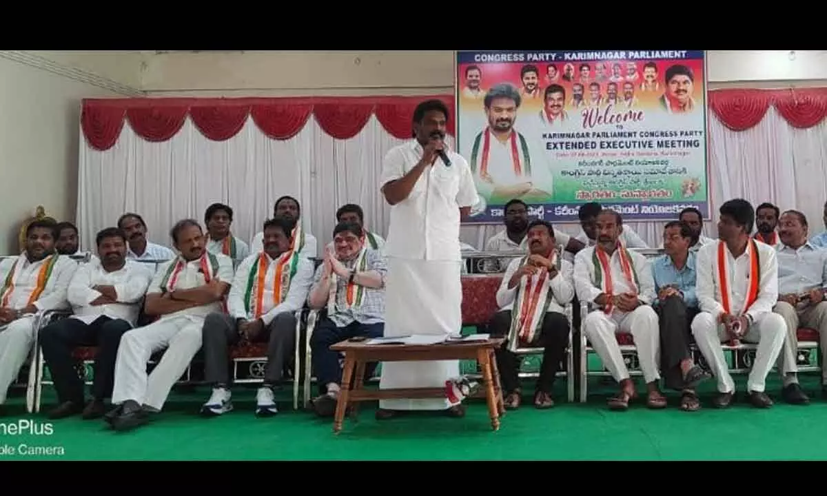 AICC secretary Christopher Tilak speaking at a Congress party meeting in Karimnagar on Monday