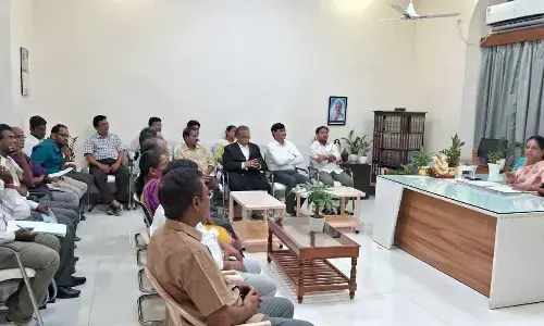 Principal District Judge Gandham Sunitha interacting with the representatives of insurance companies and lawyers at the National Lok Adalat preparatory meeting on Tuesday