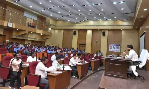 Municipal Commissioner Vikas Marmat addressing the officials at a review meeting in Nellore on Tuesday