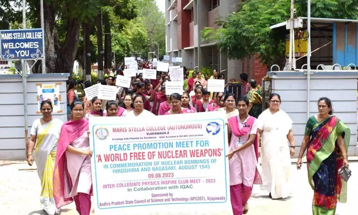 The students and staff of Maris Stella College taking out a ‘Peace March’ in Vijayawada on Wednesday