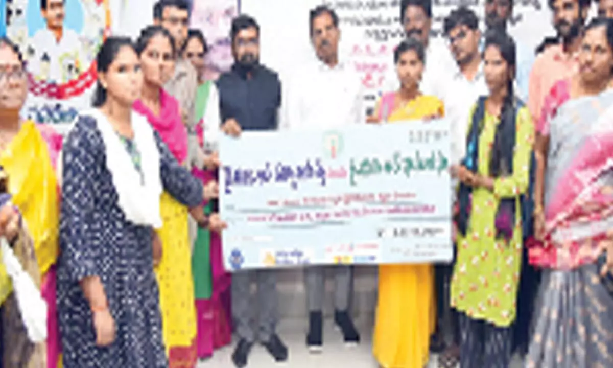 Deputy Chief Minister K Narayana Swamy, in-charge Collector DK Balaji and Sullurpet MLA K Sanjeevaiah releasing the cheque under the YSR Kalyanamasthu and Shaadi Tohfa in Tirupati on Wednesday.