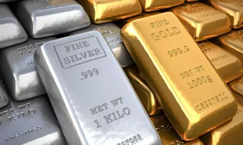 Gold rises Rs 50; silver plunges Rs 400