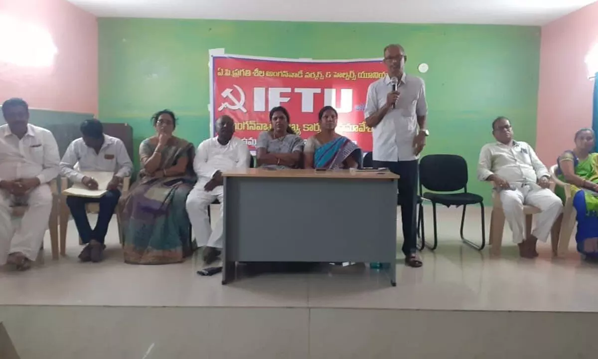 IFTU State president P Prasad speaking at a meeting held in Tirupati on Sunday