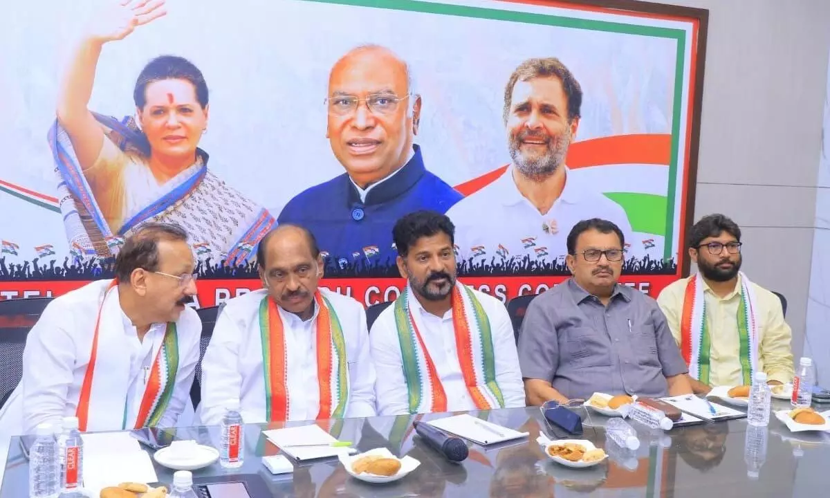 TPCC president Revanth Reddy and state Congress in-charge Manikrao Thakre at Gandhi Bhavan in Hyderabad on Monday